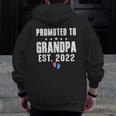 Promoted To Grandpa Est 2022 Pregnancy Reveal Pink Or Blue Zip Up Hoodie Back Print
