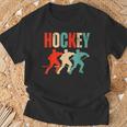 Jugador De Hockey Sobre Hielo Para Niños Retro Camiseta unisex Regalos para ancianos